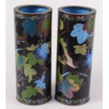 A pair of Japanese cloisonne cylindrical vases, 19th century, decorated with exotic birds,
