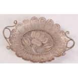 A 19th century miniature silver twin handled filigree bowl.