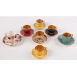 Four Royal Worcester porcelain coffee cups and saucers, two Coalport and one Wetley China.