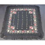 A Chinese floral embroidered black shawl, 133 x 126cm.