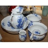 A Doulton Burslem 'Woodland' pattern blue and white toilet set comprising a large jug and bowl,