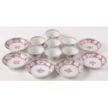 A set of six Chinese porcelain famille rose saucer dishes and seven matching tea bowls, diameter 13.