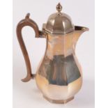 A late Victorian octagonal section coffee pot in early Georgian style by Henry Stratford London