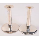 A pair of contemporary filled silver candlesticks, height 17cm.