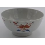 A Chinese Imari bowl decorated to the centre with a floral spray,
