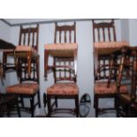 A set of six Art Nouveau dining chairs, each with a carved crest rail,