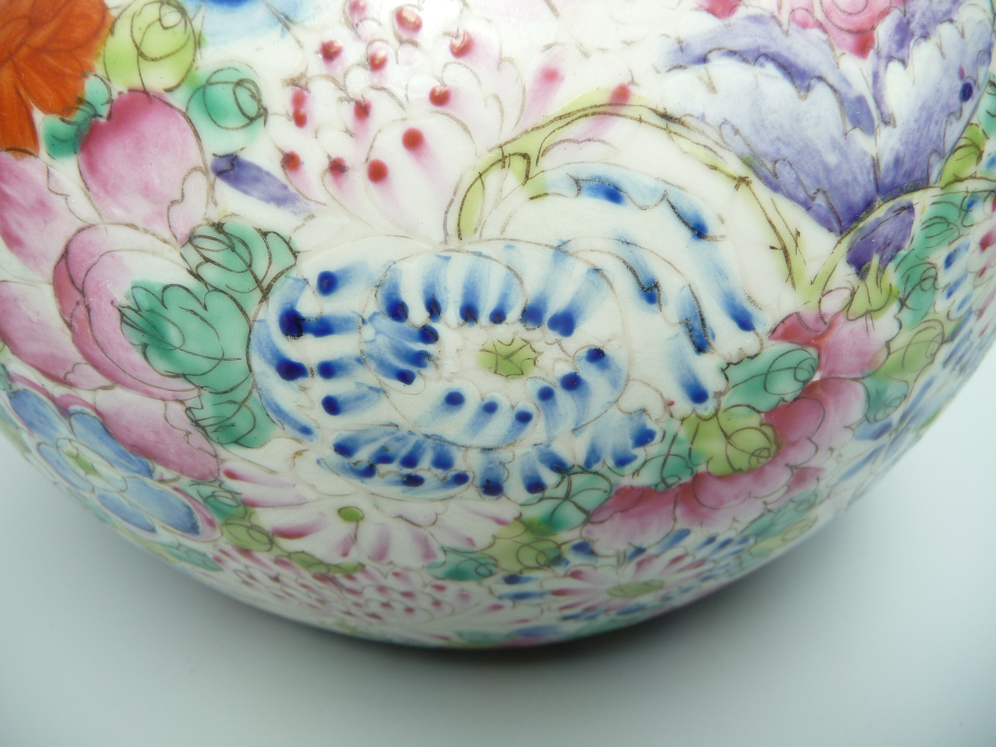 A Chinese porcelain millefiori bowl, densely painted with flowers on a white ground, - Image 4 of 10