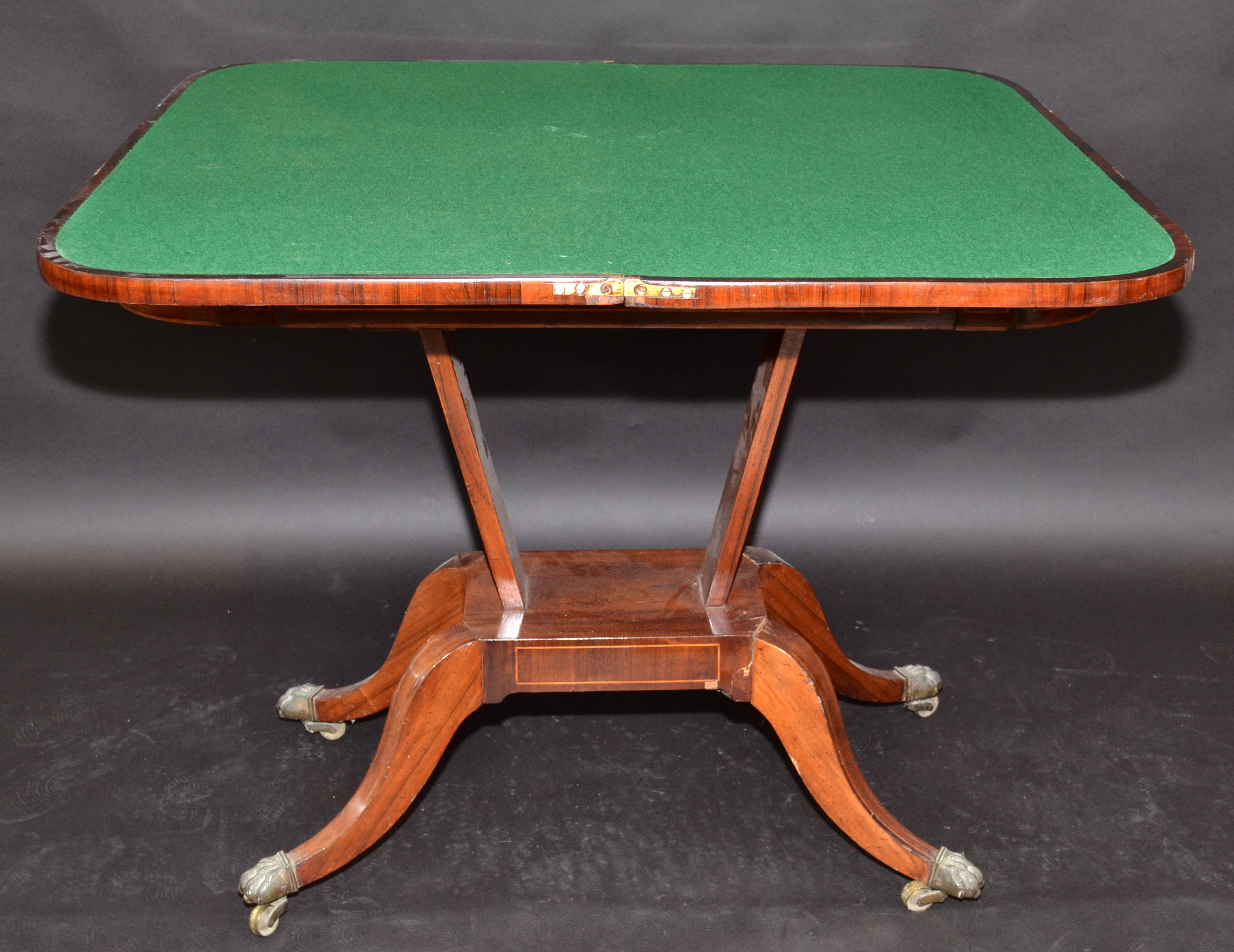 A Regency inlaid, fold top card table on four sabre legs with lions paw feet, width 91.5cm. - Image 3 of 3