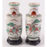 A pair of Chinese cloisonne vases, with carved wood stands and original box,