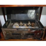 A fine but dilapidated 10 air cylinder music box with bells,