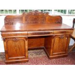 A Victorian mahogany veneered twin pedestal sideboard,