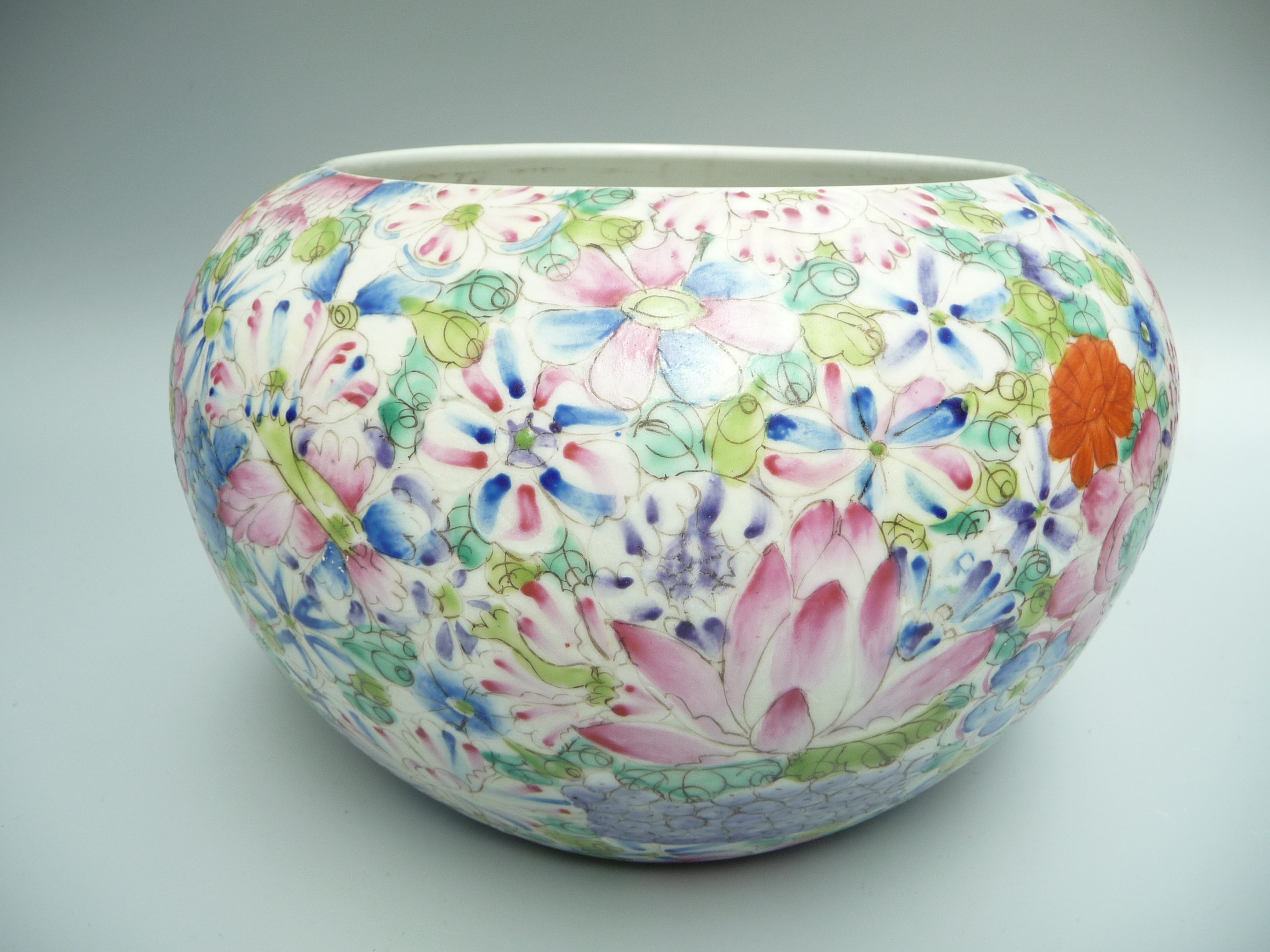 A Chinese porcelain millefiori bowl, densely painted with flowers on a white ground, - Image 2 of 10