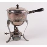 An EPNS circular saucepan with a turned ebony handle on a spirit burner stand.