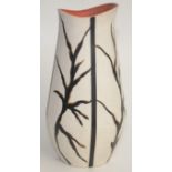 A Brentleigh Ware pottery vase, with abstract branch decoration on an ivory ground, height 38cm.