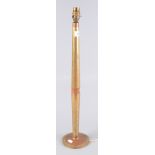 A brass and copper banded table lamp, height 62cm.