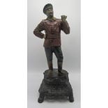 A spelter painted figure of Vladimir Lenin standing on a plinth base, height 40cm.