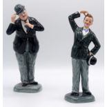 A pair of Royal Doulton porcelain figures of Stan Laurel and Oliver Hardy, HN 2774 and 2775.