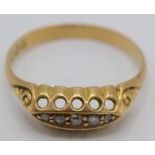 A Victorian style 18ct gold ring set five small diamonds. Condition report: 2.