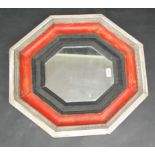 A hexagonal mirror with moulded painted tray in Dutch style.