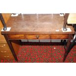 A George III mahogany fold top breakfast table with a drawer to one side on square section moulded