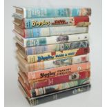 Eleven hardback volumes of 'Biggles' by Capt W.E. Johns.