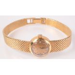 A ladies 18ct gold Omega Ladymatic diamond dial wristwatch with integral woven 18ct gold bracelet,