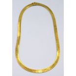 An 18ct gold 1970's Egyptian Revival collar necklace, 36.18g.