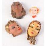 Three plaster portrait masks of ladies, entitled 'Leandra', 'Loretta' and one unmarked,