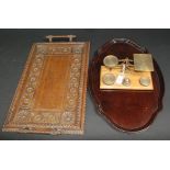 A set of post office scales with brass weights, together with two trays.