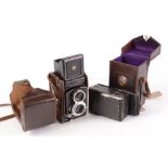 A Minolta Autocord twin lens reflex camera and leather case,