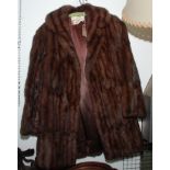 A mink coat, the label inscribed 'Furriers-Couturiers Hickleys, Southampton & Winchester',