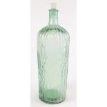 A large green glass bottle with stopper, inscribed 'Poison Not To Be Taken', height 38.5cm.