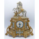 A 19th century gilt metal and spelter mantel clock,