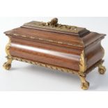 A carved parcel gilt casket,