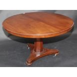 A Victorian mahogany snap top table with tripod base, diameter 123cm.