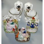 Three Victorian Staffordshire pottery groups, largest 21cm and a pair of Staffordshire spaniels,
