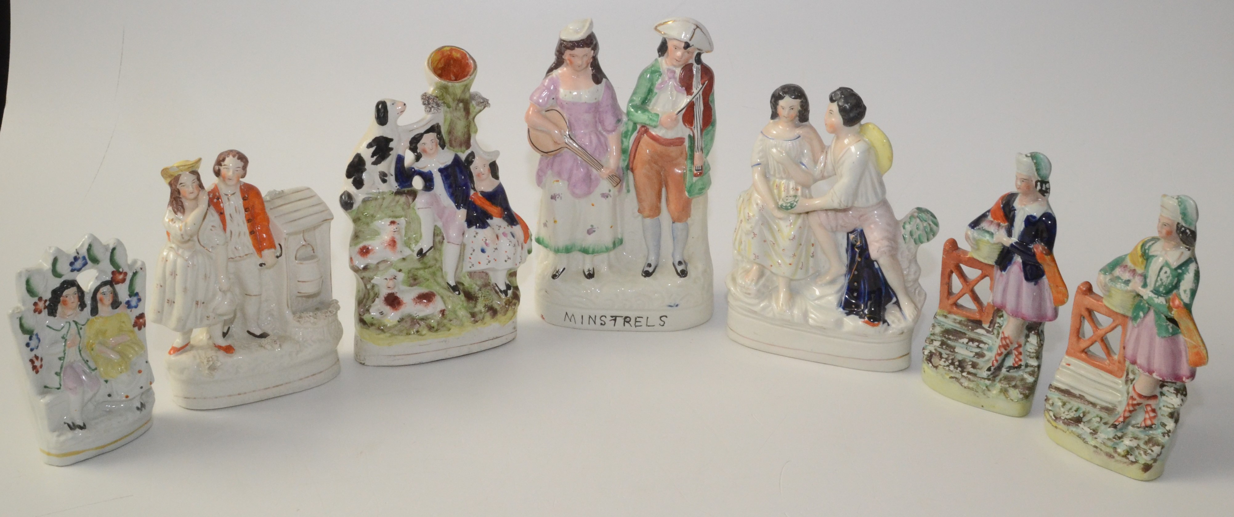 A Victorian Staffordshire pottery group entitled Minstrels, height 26cm,