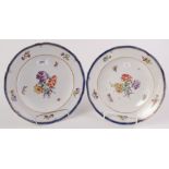 A pair of porcelain plates, 18th century, with pseudo red anchor mark to the underside,