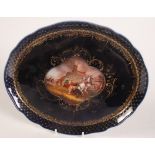 A Dresden porcelain oval dish, with gilt decorated cobalt blue ground,