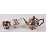 A George V three piece silver tea service, London 1922 and 1923. 29oz.