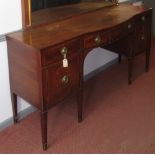 A Georgian style mahogany sideboard with bow front central drawer.