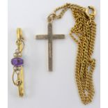 A 9ct gold cross pendant on a gilt chain,