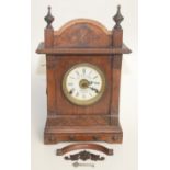 A Fattorini & Sons oak cased patent automatic alarm clock, early 20th century, height 44cm.