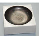 A Troika Pottery ashtray, Louise Jinks potter's mark to base, height 4.5cm, width 12.5cm.