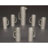 A Gerald Benny Viners pewter cocktail jug and six mugs,
