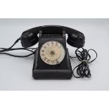 A French black bakelite telephone, height 13.5cm.