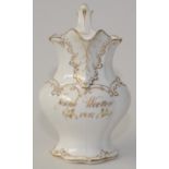 A 19th century pottery jug with gilt inscription 'Joseph Wootton 1847',