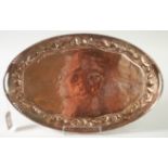 A Newlyn Copper oval tray with a pair of handles and pierced gallery,