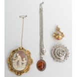 A Victorian cameo brooch, an engraved silver brooch, a silver necklace and a gilt fob.