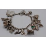 A silver charm bracelet, 56.g.